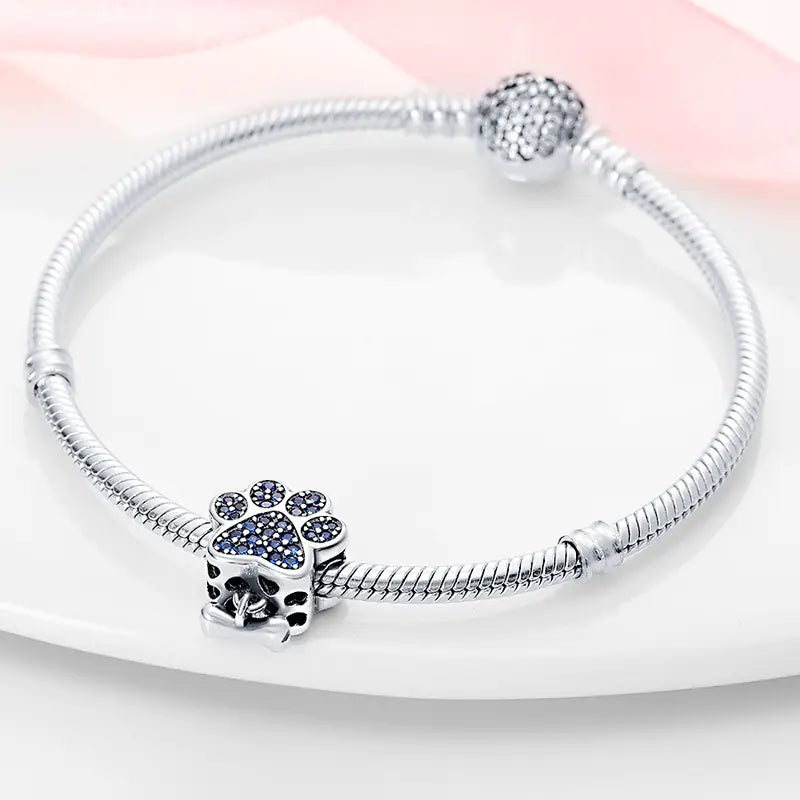 Elegant Silver Paw & Bone Charm