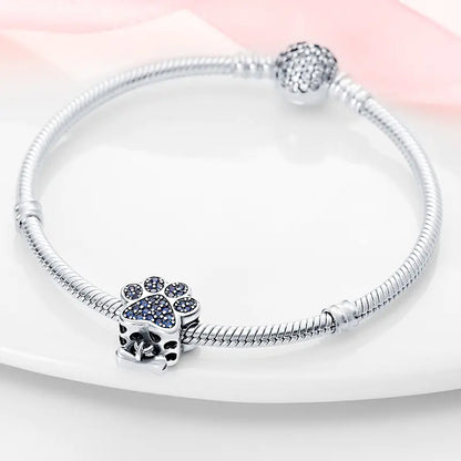 Elegant Silver Paw & Bone Charm